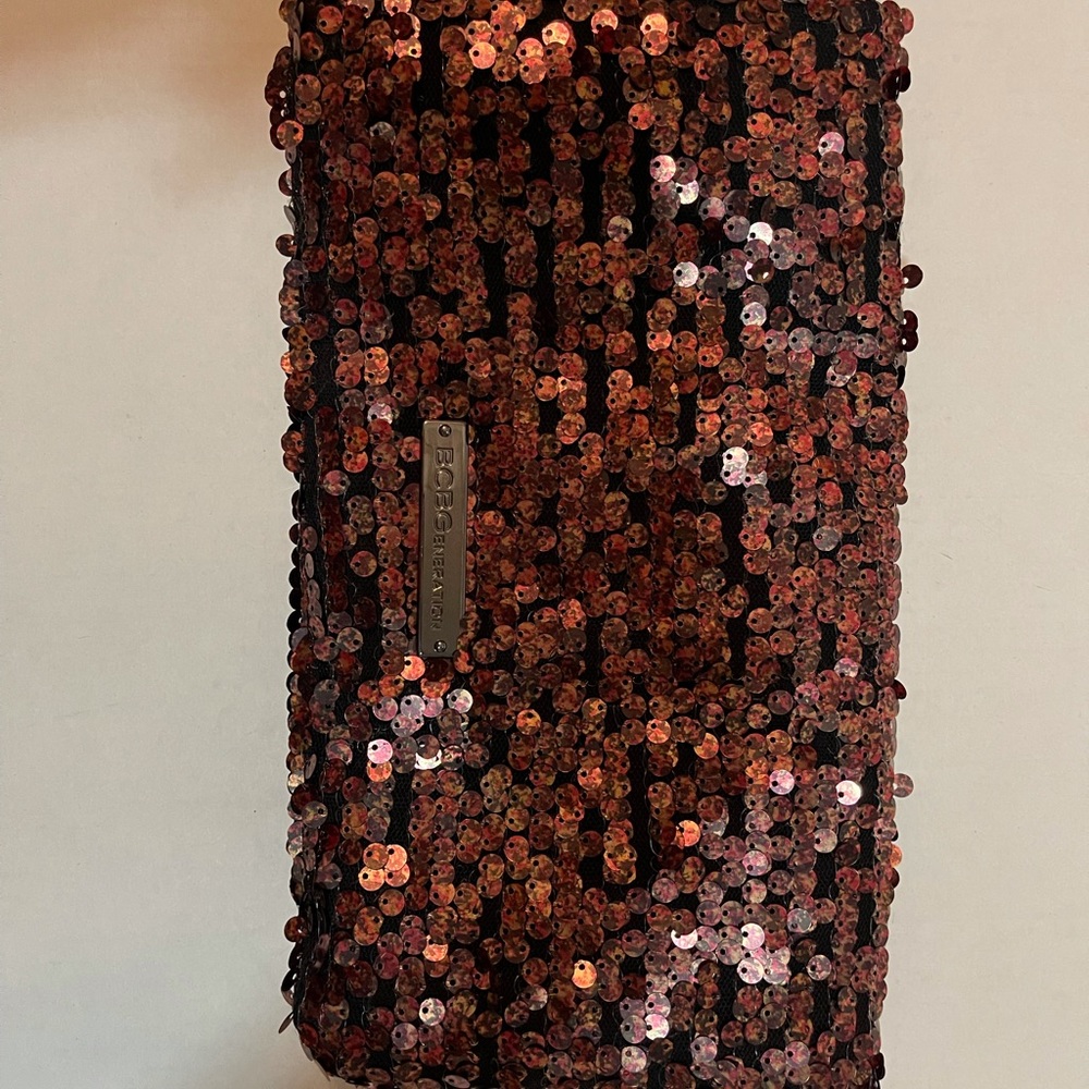 BCBGeneration Sequin Clutch BNWT Retail $68 in Burgandy.